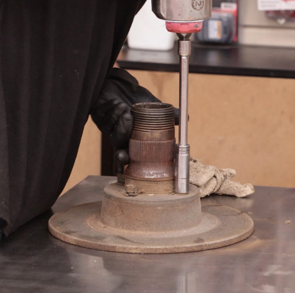 Unbolting the rotor from the front hub of an MGB GT